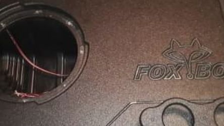 Single 12 in ported sub enclosed for Dodge Ram crew an quad cab. Custom fox box by fox accustics.