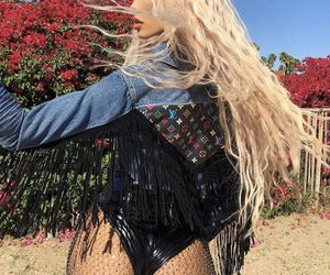 Fringe denim jacket .