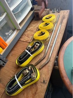 Straps and tie down bars