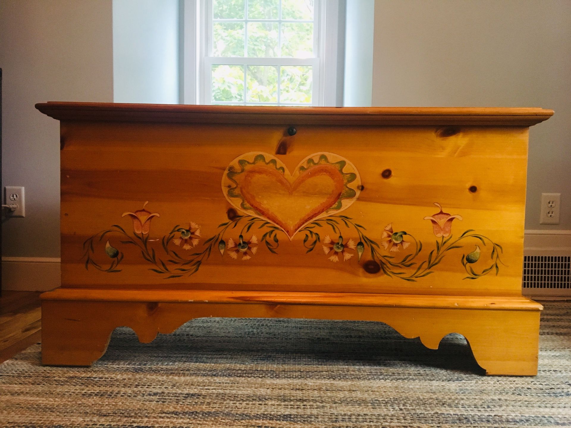 A Lane Cedar Hope Chest in Pine with Heart Design on the front