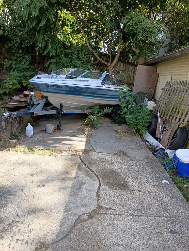 boat with the trailer 1000 or obo don't know what's wrong with but have title need it gone