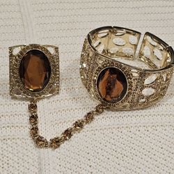 Costume bracelet W/ attached ring