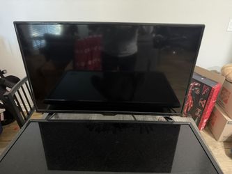 Two TVs 32 in And 32 in.