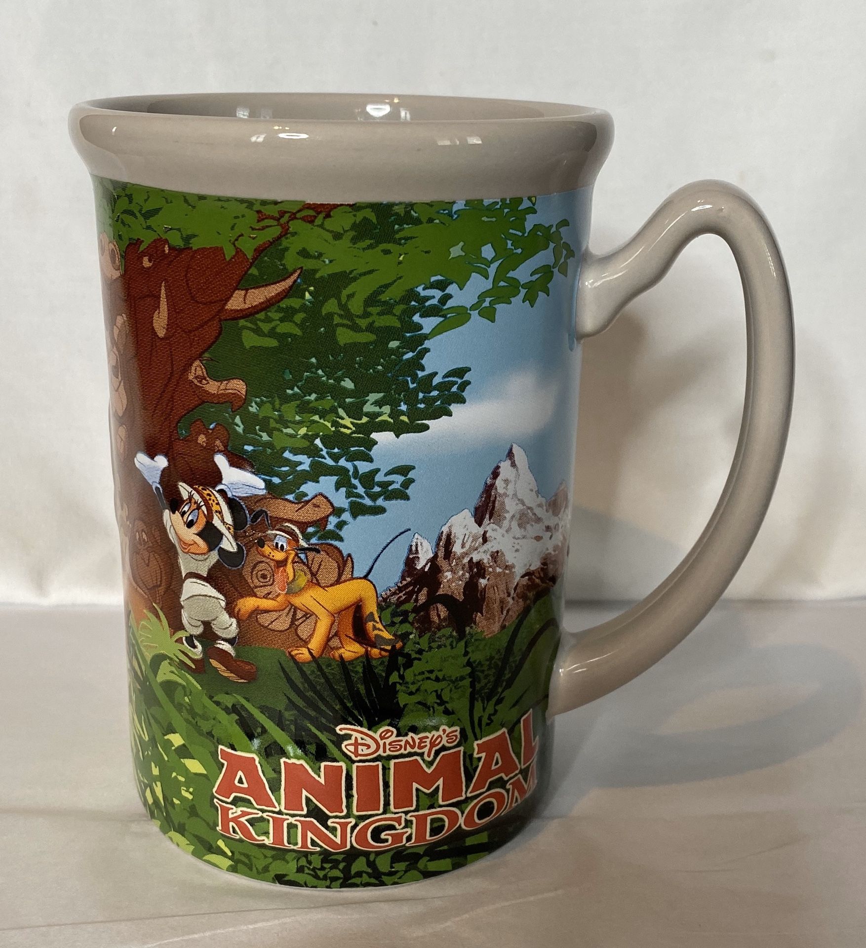 Disney's Embossed Animal Kingdom Mug - Goofy, Mickey, Daffy, Pluto