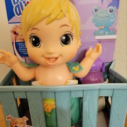 Baby Alive Baby Gotta Bounce doll is a 12-inch girl doll with blonde hair, made of plastic