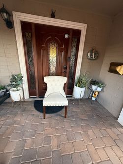 Pretty beige upholstered accent chair  $25