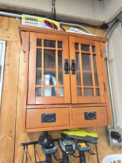 Vintage oak cabinet with glass doors