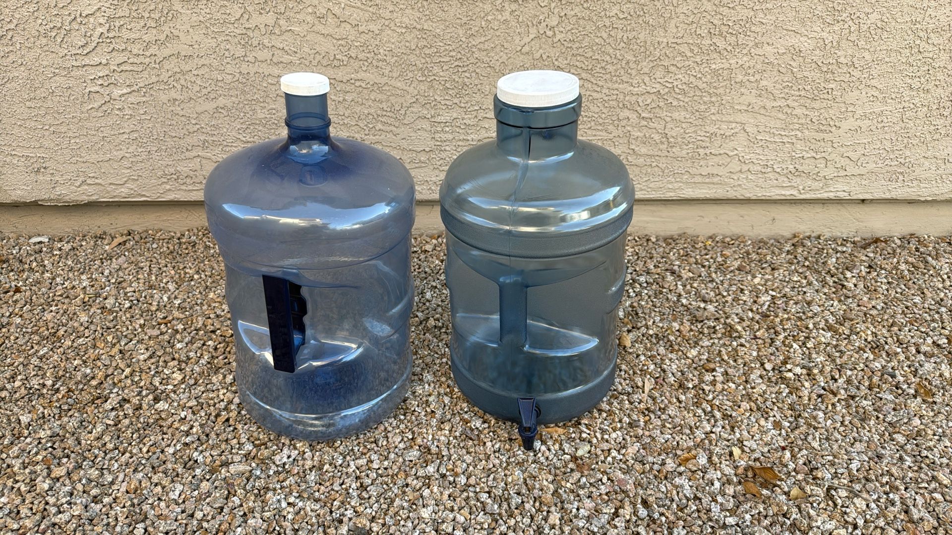 2 Five Gallon Water Bottles