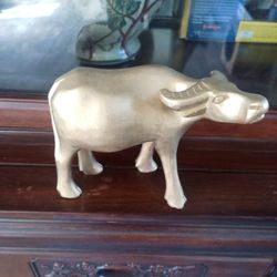 Wooden hand carved cow