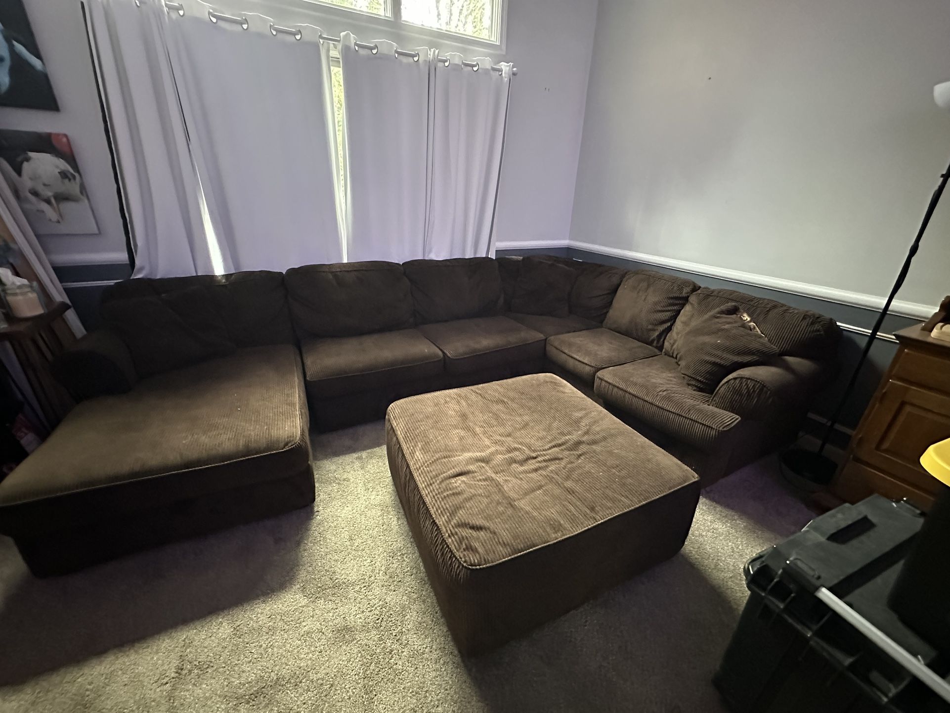 Brown Sectional Couch And Ottoman