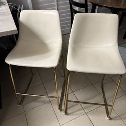 Beige Leather Barstools With Gold Accents 
