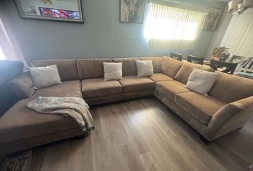 Brown sectional couch U Shape
