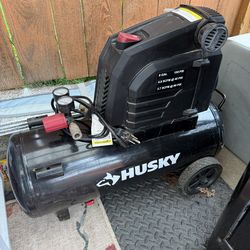 Husky 8-Gallon 150 PSI Hotdog Air Compressor.