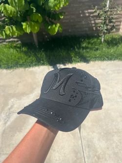 Thirty-one Black El Mago hat