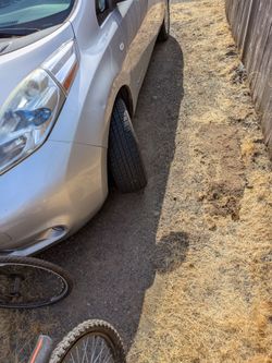 Nissan leaf runs great electric car has broken control arm and tie rods one side repair and drive 62000 miles 52 miles on a charge $1400 obo