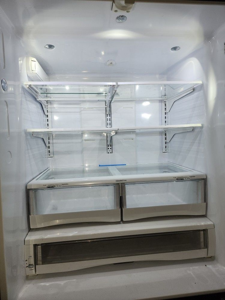 GE refrigerator ,Silver  68"L × 35"W