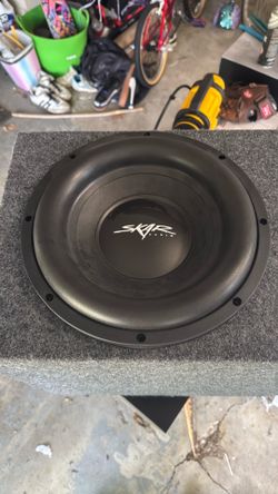 10” skar subwoofer in box.