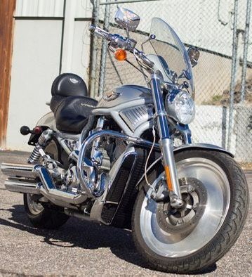 L2003 Harley-Davidson V-Rod 9k miles on this great Anniversary Edition Bike. 2 Cyl ,1130cc, 5 sp