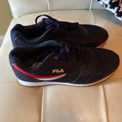 Brand New Pair of 8.5 Unisex FILA Sneakers in Navy Blue.