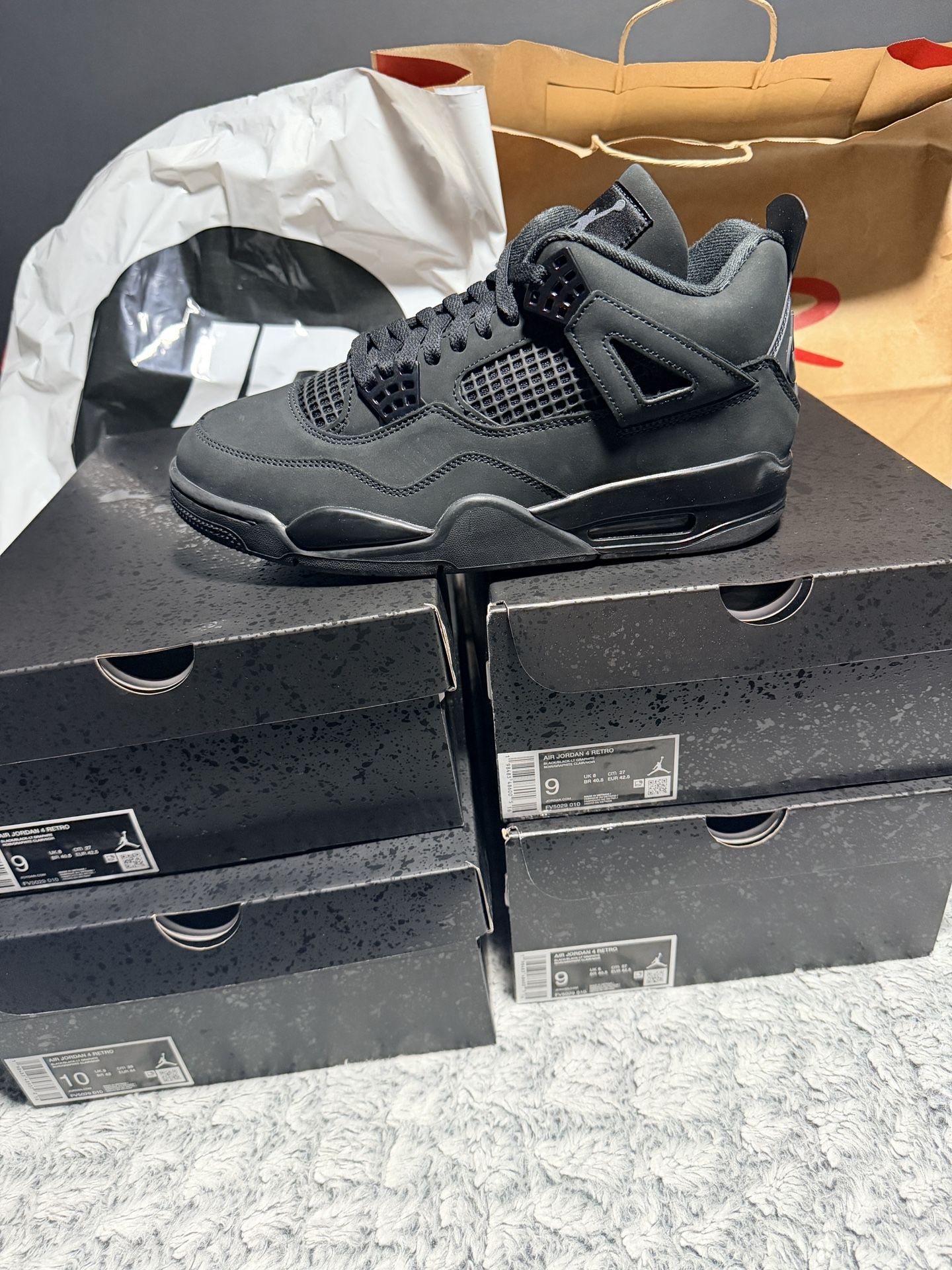 Black Cat Jordan 4s