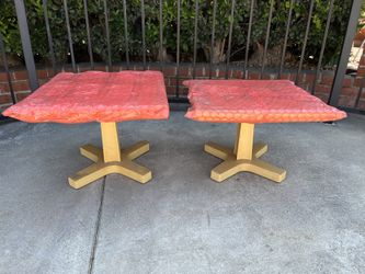 Two low white marble top tables
