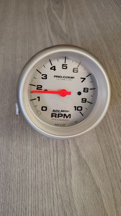 Auto Meter Tachometer