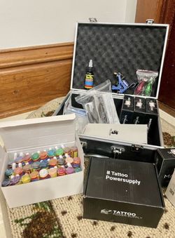 Brand New Tattoo Kit With Case, 4 Machines, Ink, + All Materials Needed I practiced a handfull of times using 1 machine that is opened and lost intere