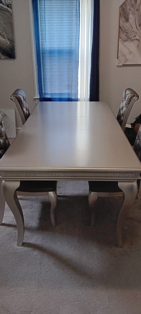 Silver dining room table