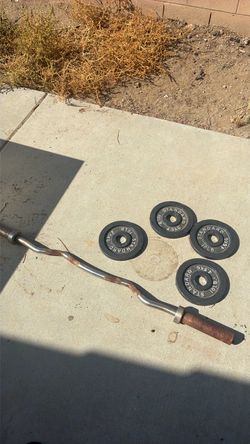 EZ Bar with 40lbs of cast iron plates