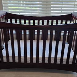 Gently Used Dark Wood Crib, mattress, and mattress cover