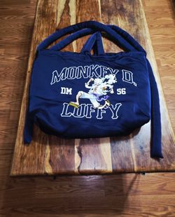 Dim Mak x One Piece "Monkey D. Luffy" Embroidered Tote Bag.