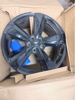 4 ford mustang brand new rims with 2 tires