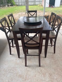 Dining table with chairs and lazy Susan