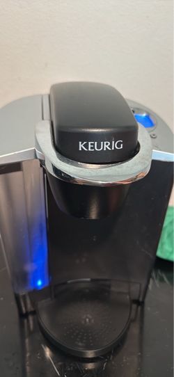 Black and silver Keurig coffee maker