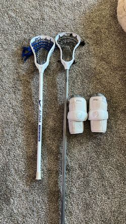 Lacrosse Sticks And Elbow Guards