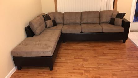 Brand new sectional with reversible chaise
