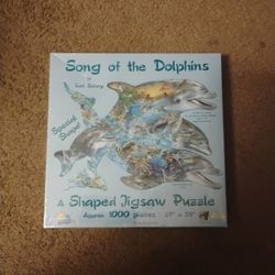 A SHAPED  DOLPHINS JIGSAW PUZZLE 