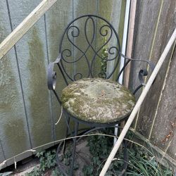 Two Wrought Iron Chairs ..