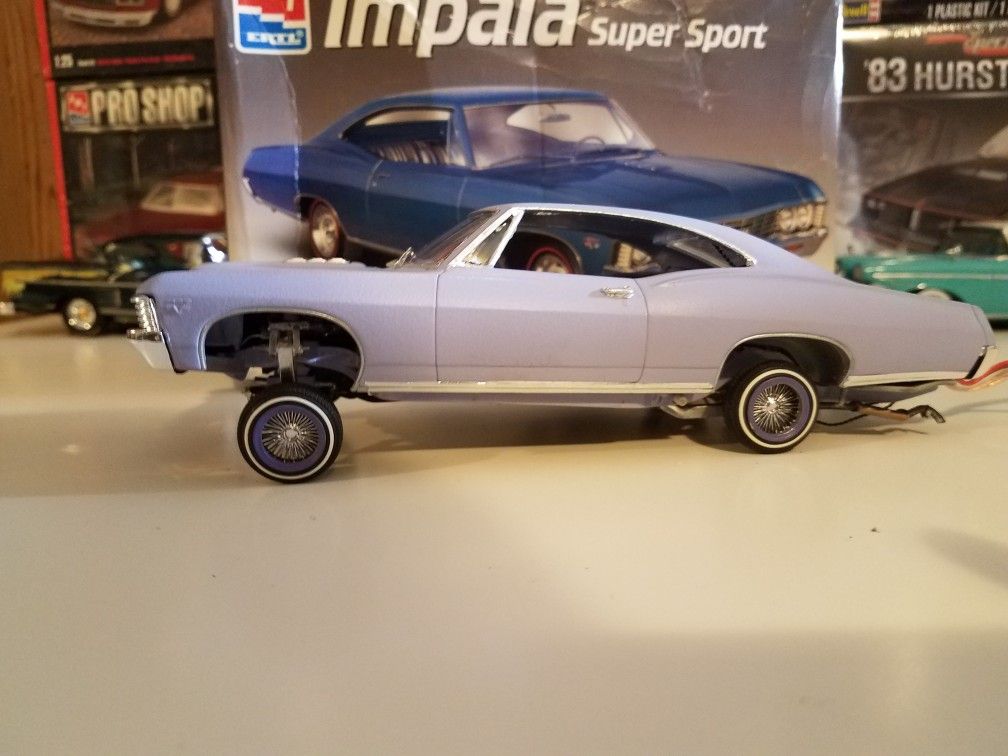 1967 Chevy Impala lowrider model car kit on D's with hydraulics