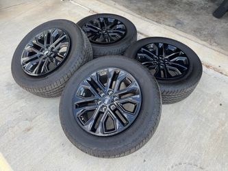 20” ford f150 black oem wheels