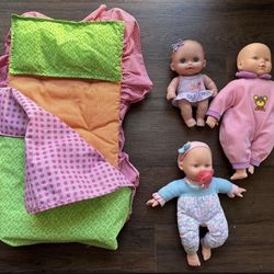 Doll Bed And Three Dolls $15 for all