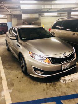 2013 Kia Optima Hybrid 180k miles. $1,200