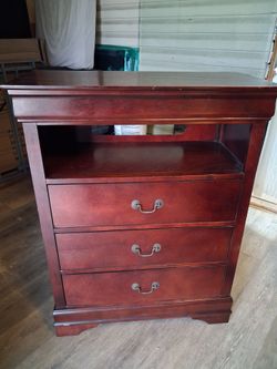 Brown wood stand dresser