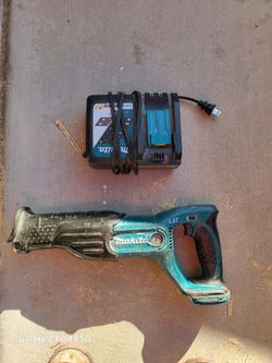 Makita Saw and charger.