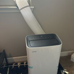 8,000 (DOE) BTU Portable Air Conditioner Cools 350 sq. ft. with Dehumidifier and Remote Control in White by Toshiba 