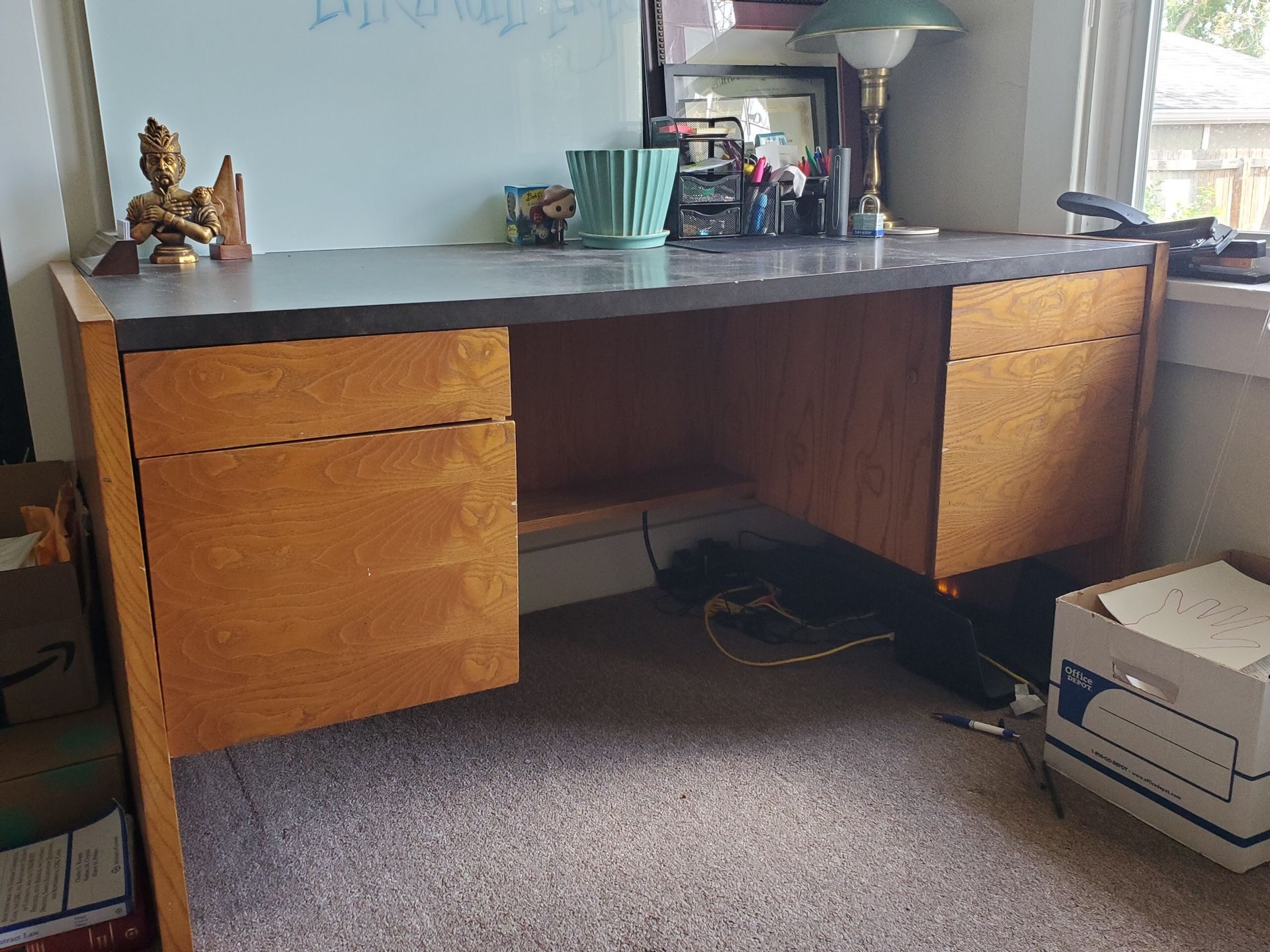 Solid desk with built in footrest