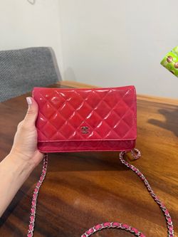Chanel Pink Patent Leather Wallet on Chai)  Beautiful Chanel WOC with authenticity card and matching serial number.  The interior is in excellent cond