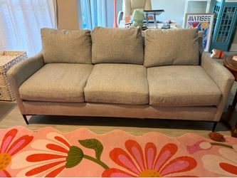 Weir’s light blue three seat couch