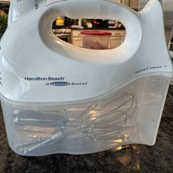 Electric hand mixer with accessories