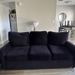 All black velvet couches